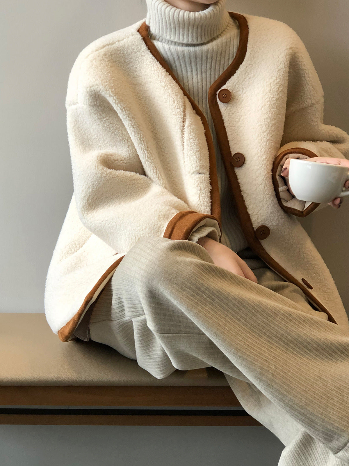 Manteau en laine avec fourrure polaire