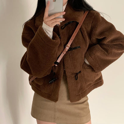 Veste courte ample en laine d'agneau doublée