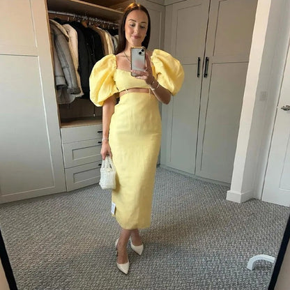 Robe vintage populaire à manches bouffantes et taille haute