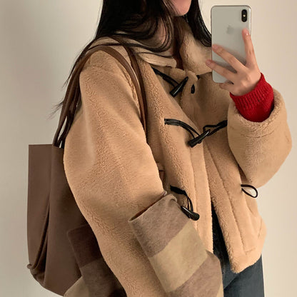 Veste courte ample en laine d'agneau doublée